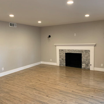 Cozy Living Room with Stone Fireplace