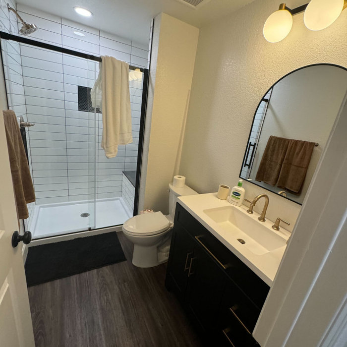 Inspiration for a mid-sized timeless basement remodel in Denver
