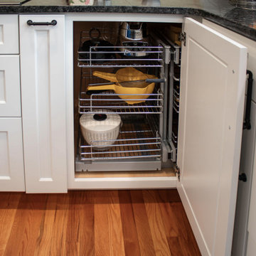 Kitchen with White Perimeter and Blue Island Cabinet Reface