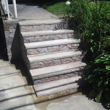 Concrete stair overlays that look like natural stone that we've done