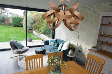 Example of a large trendy open concept living room design in London