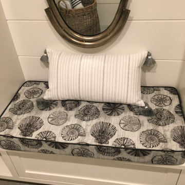 A fully equipped laundry room with a built ins