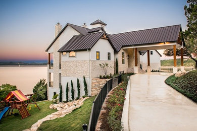 Country beige stone gable roof idea in Houston
