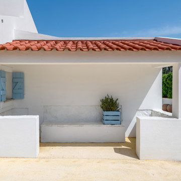 Exterior Alcove with Blue Shutters in Bom Sucesso