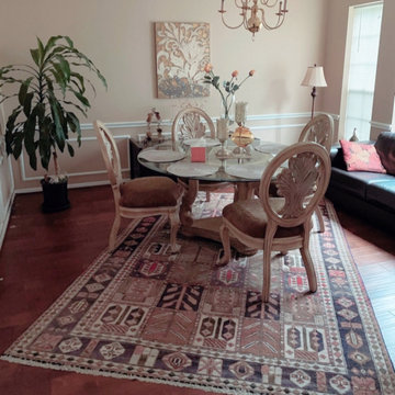 Four Seasons Design Persian Baktiari Rug charms dining room design!