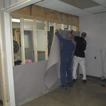 Step 2 - Secure row 2 of material with fasteners to wall stud