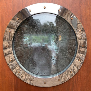 Porthole with Bronze Studs