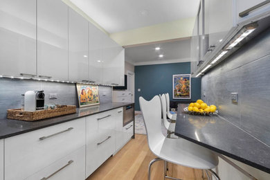 Example of a trendy dining room design in New York