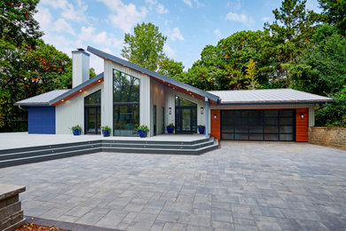 Inspiration for a modern house exterior remodel in Minneapolis