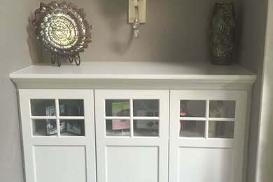 Small transitional carpeted and beige floor hallway photo in Chicago with gray walls
