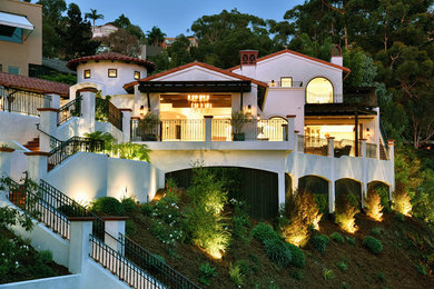 Inspiration for a mediterranean home design remodel in San Diego