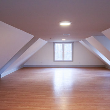 Attic Bedroom Renovation with Vaulted Sloped Ceilings