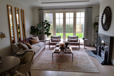 Medium sized contemporary living room in Surrey.