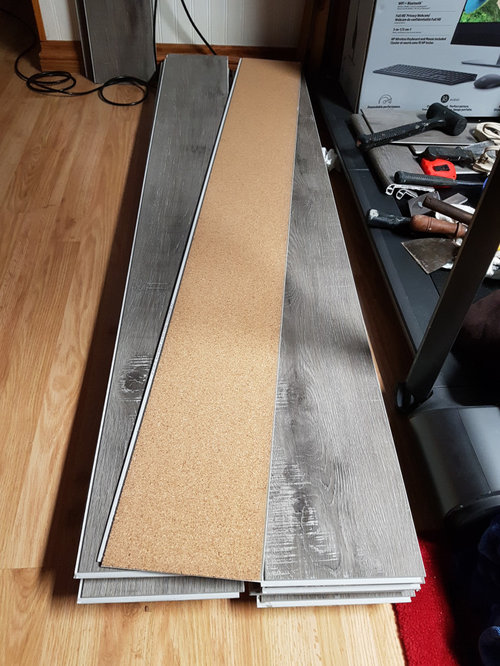 Waterproof laminate floor over vinyl flooring problems