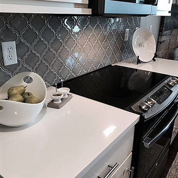 Cambria Brittanicca Kitchen Island and Cambria Whitehall Perimeter