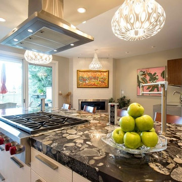 Verde Marinace granite Island countertop,. Perimeter- Caesarstone quartz