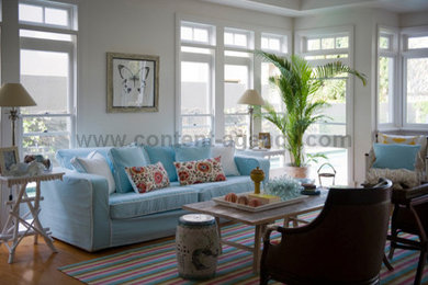 Design ideas for a tropical living room in Brisbane.