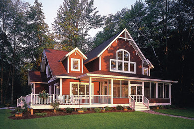 Rustic brown two-story wood exterior home idea in Other