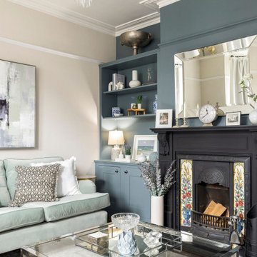 Calm & serene living room with a mix of chrome & brass metal accents