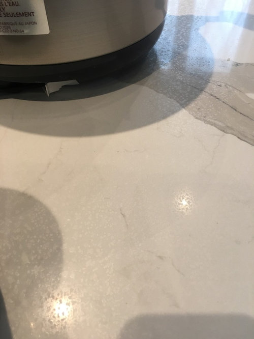 Weird Blemishes And Cloudy Areas On Quartz Countertop