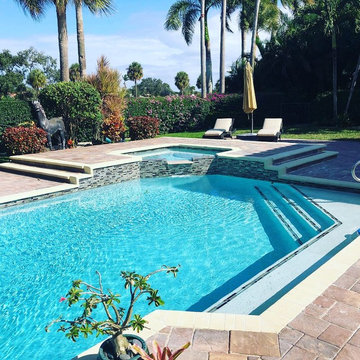 Boca Remodel, New pool finish, tile,coping, and sun shelf