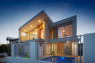 Inspiration for a contemporary two-storey white exterior in Perth.