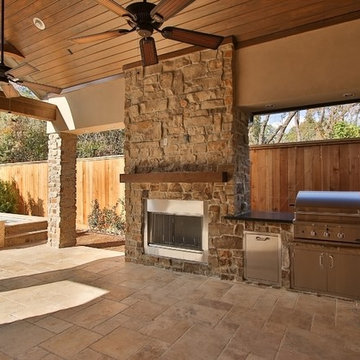 Combining Stucco and Stone bring charm to this Country French