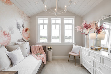Example of a transitional girl carpeted, beige floor and wallpaper kids' room design in Toronto with beige walls