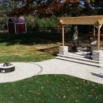 Unilock Elevated Patio, Sidewalk, Seat Wall and Gas Fireplace