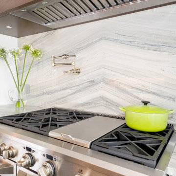 Foxtop Transitional Kitchen with Striking Quartzite Countertops