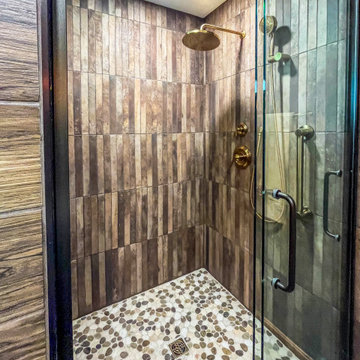 Custom Rustic Bathroom with Knotty Alder Vanity and Cambria Quartz
