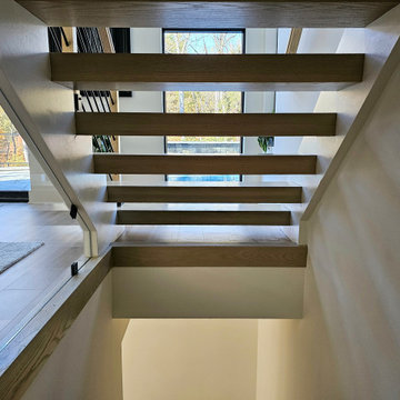 Project #111 | Open-Riser Staircase with Glass Panel Detail