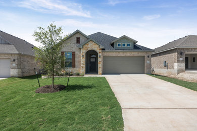 Transitional exterior home idea in Austin