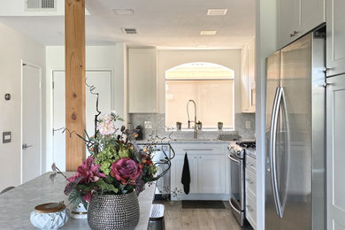Example of a transitional kitchen design in Orange County