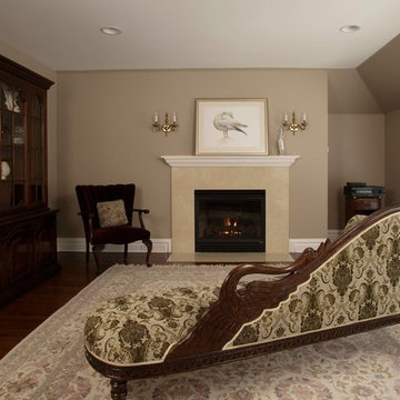 Master Suite Sitting Room with Limestone Surround Fireplace