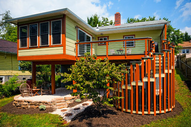 Example of a trendy two-story exterior home design in Other