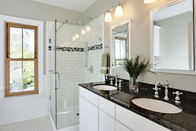 Alcove shower - mid-sized traditional master white tile and subway tile porcelain tile alcove shower idea in Phoenix with an integrated sink, flat-panel cabinets, white cabinets, granite countertops and beige walls