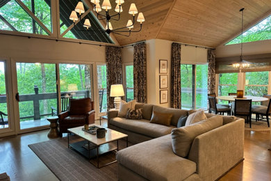 Example of a mid-sized transitional living room design in Raleigh