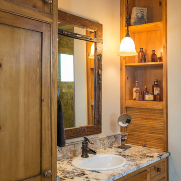 Water tower inspired home guest master bath suite