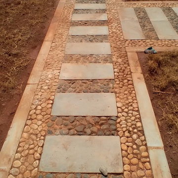 Concrete and pebble footpath