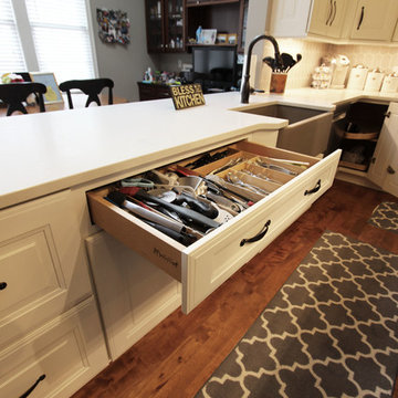 White Kitchen with Espresso Island and Eternia Caringdale Quartz Countertop