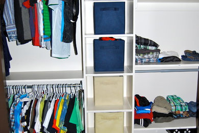 Mid-sized elegant men's carpeted reach-in closet photo in Salt Lake City
