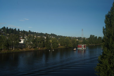 Example of a minimalist two-story concrete fiberboard exterior home design in Seattle
