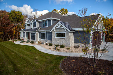 Arts and crafts blue two-story mixed siding house exterior photo in Other
