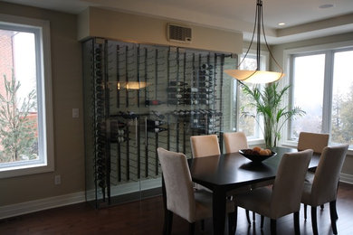 Example of a minimalist wine cellar design in Ottawa