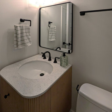 Panoramic Penthouse: Black-Trim Vanity with Marble Counter