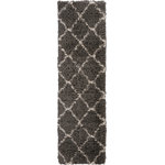 Nourison - Nourison Luxe Shag 2'2" x 7'6" Charcoal/Beige Shag Indoor Area Rug - This exceptionally plush 2-inch-deep shag rug from the Nourison Luxe Shag Collection has the look and feel of luxuriously soft sheepskin, and makes a perfect addition to any casual room setting. Luxurious texture and Moroccan lattice pattern on deep grey color for a warm, soothing accent.