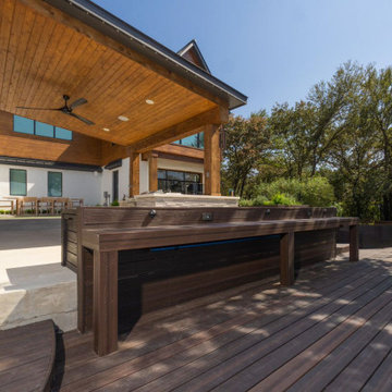Waterfront deck with pool featuring Rustic Walnut composite decking