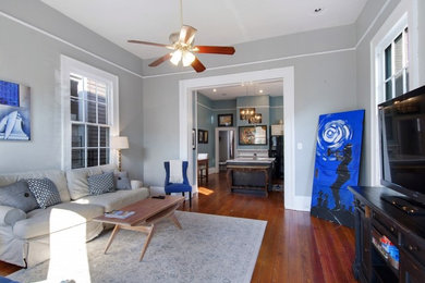 Elegant family room photo in New Orleans