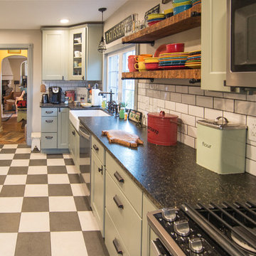 Retro kitchen with checkered floor in Upper St. Clair, PA